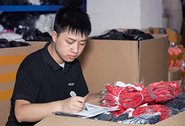 Packing and counting clothes for shipment